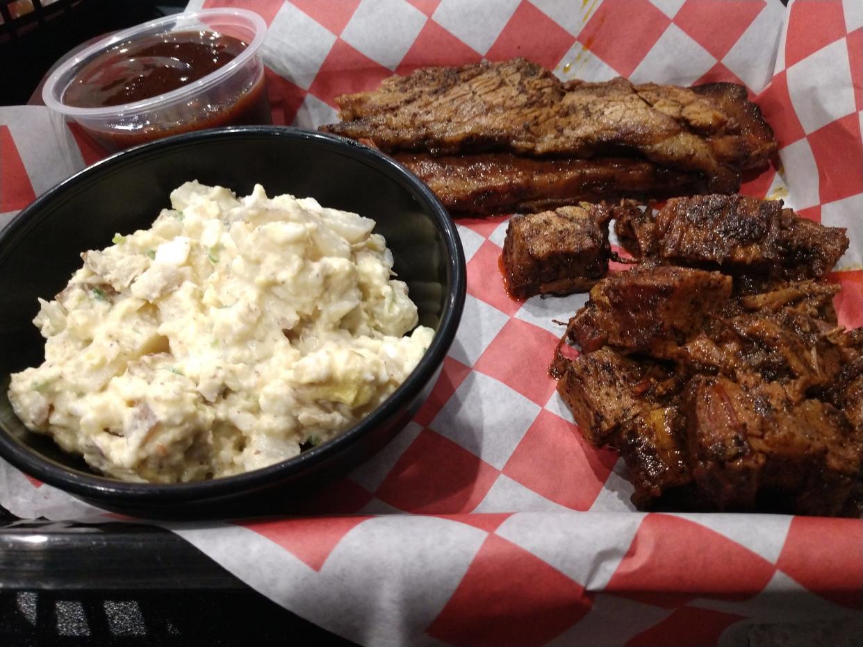 The burnt ends, brisket at potato salad at Rolling Smoke Barbeque in Pleasant Hill.