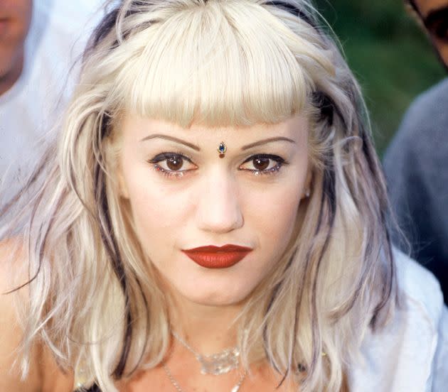 They're baaaaack. Thin brows like the ones seen here in the 1990s on Gwen Stefani are trending again. (Photo: Tim Mosenfelder via Getty Images)