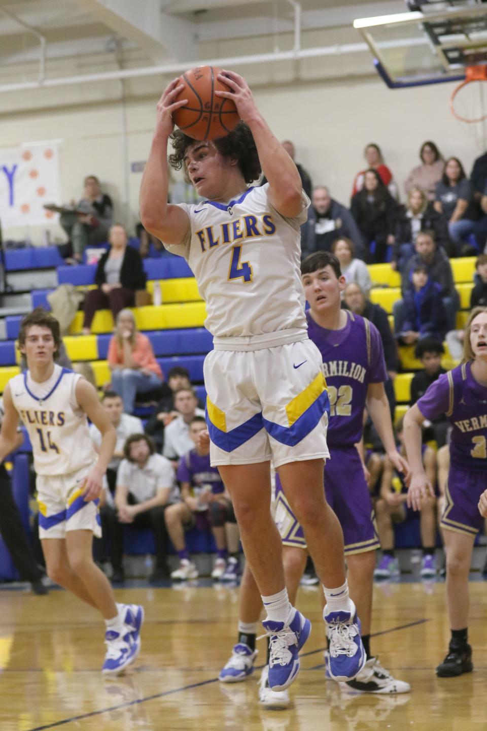 Clyde's Cole Schwochow grabs a rebound.