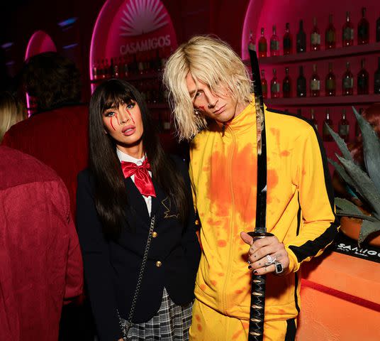 <p>Matt Winkelmeyer/Getty</p> Megan Fox and Machine Gun Kelly dressed as 'Kill Bill' characters