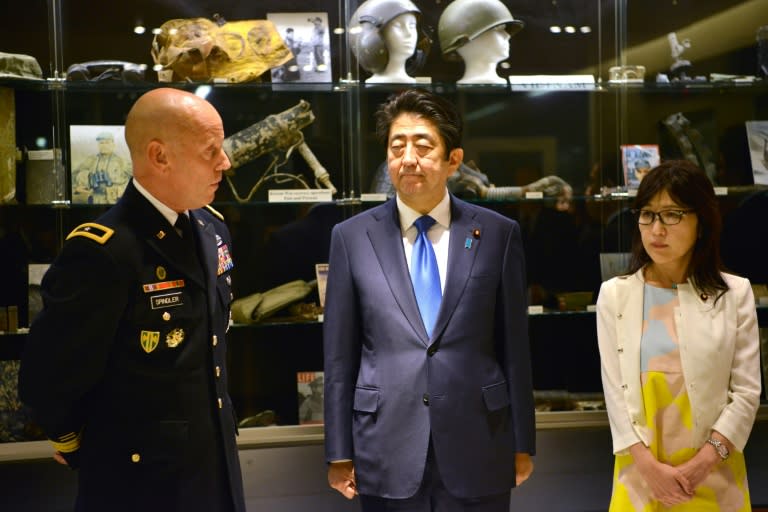 US Army Brig. Gen. Spindler briefs Prime Minister Shinzo Abe and Defense Minister Tomomi Inada during the Japanese leader's visit to Pearl Harbor in Honolulu, Hawaii