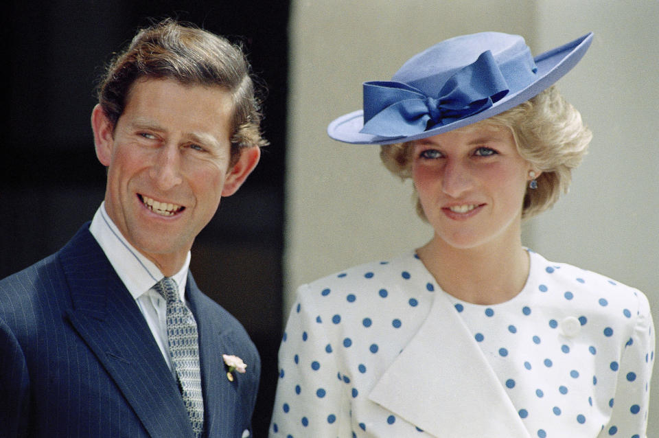 FILE - Britain's Prince Charles with his wife Princess Diana in front of Lodge Canberra, Australia, Nov. 7, 1985. King Charles III will hope to keep a lid on those tensions when his royally blended family joins as many as 2,800 guests for the new king’s coronation on May 6 at Westminster Abbey. All except Meghan, the Duchess of Sussex, who won’t be attending. (AP Photo, File)