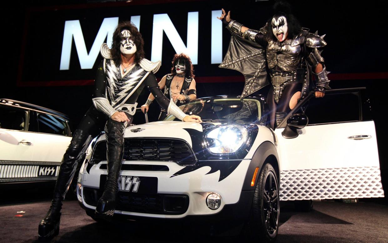 Would you buy a car from these men? Kiss making a promotional appearance for Mini, in 2011