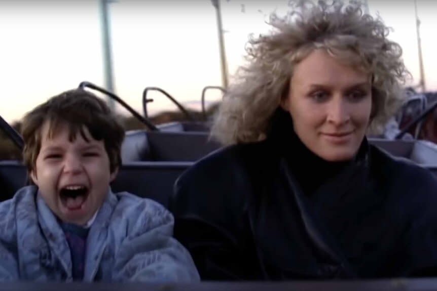 Ellen Gallagher (Ellen Hamilton Latzen) and Alex Forrest (Glenn Close) ride a roller coaster together in Fatal Attraction (1987).