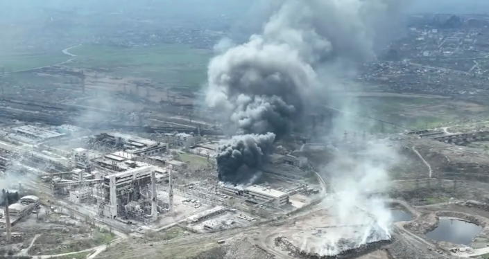 Smoke rises above Azovstal Iron and Steelworks in Mariupol.