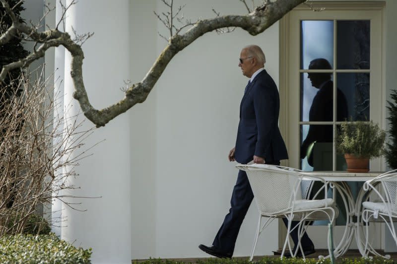 President Joe Biden walks out of the West Wing toward Marine One before departing from the South Lawn of the White House on Thursday. The President is heading to Leesburg, Virginia, where he will deliver remarks at the House Democratic Caucus Issues Conference. Photo by Samuel Corum/UPI