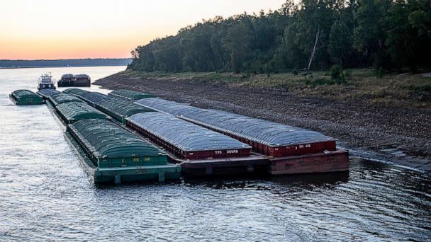 PHOTO: Barges idle while waiting for passage in the Mississippi River near Vicksburg, Miss., on Oct. 4, 2022.  (Thomas Berner via AP)