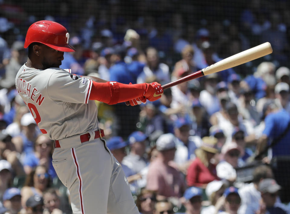 FILE - In this May 23, 2019, file photo, Philadelphia Phillies' Andrew McCutchen hits a double against the Chicago Cubs during the first inning of a baseball game in Chicago. McCutchen says he plans to be ready for opening day after a knee injury cut short his 2019 season. (AP Photo/Nam Y. Huh, File)