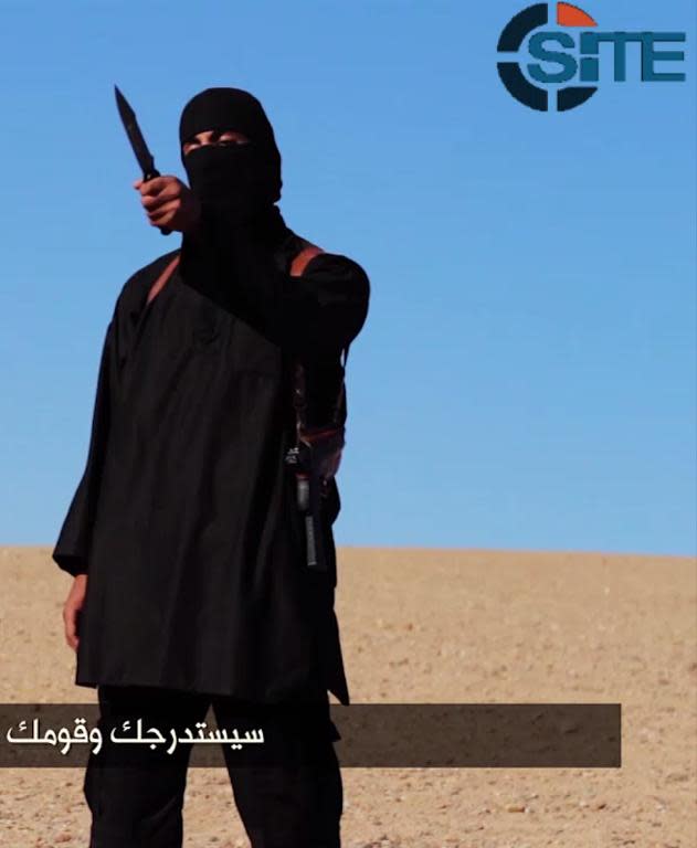 A grab from an Islamic State video identified by private terrorism monitor SITE Intelligence Group on September 13, 2014 is said to show a masked militant speaking to the camera before beheading British aid worker David Haines