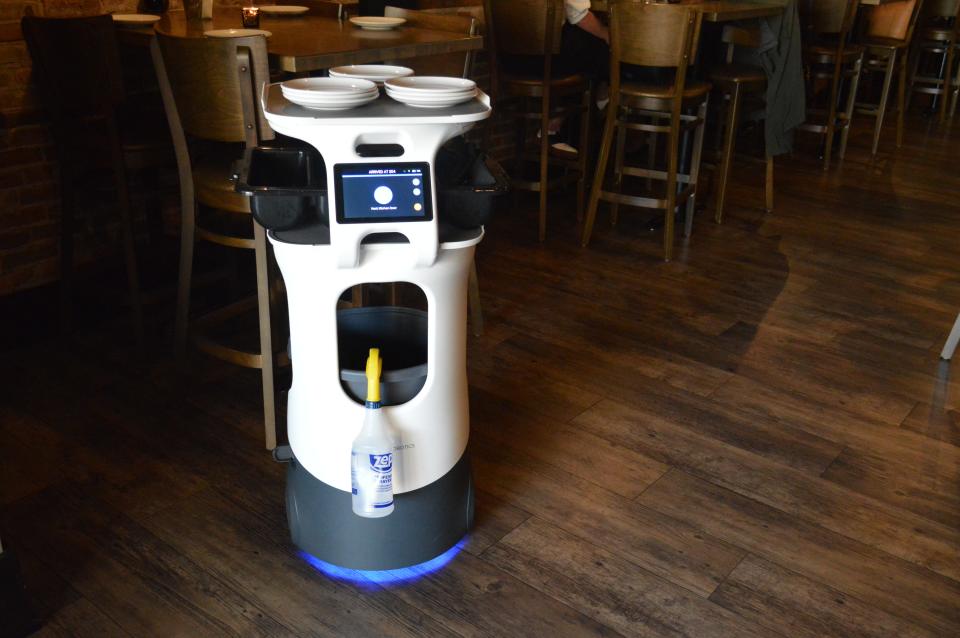 Servi, a new robot at Mangiare, 121 N. Adams St. in Green Bay, transports dishes to and from the kitchen.