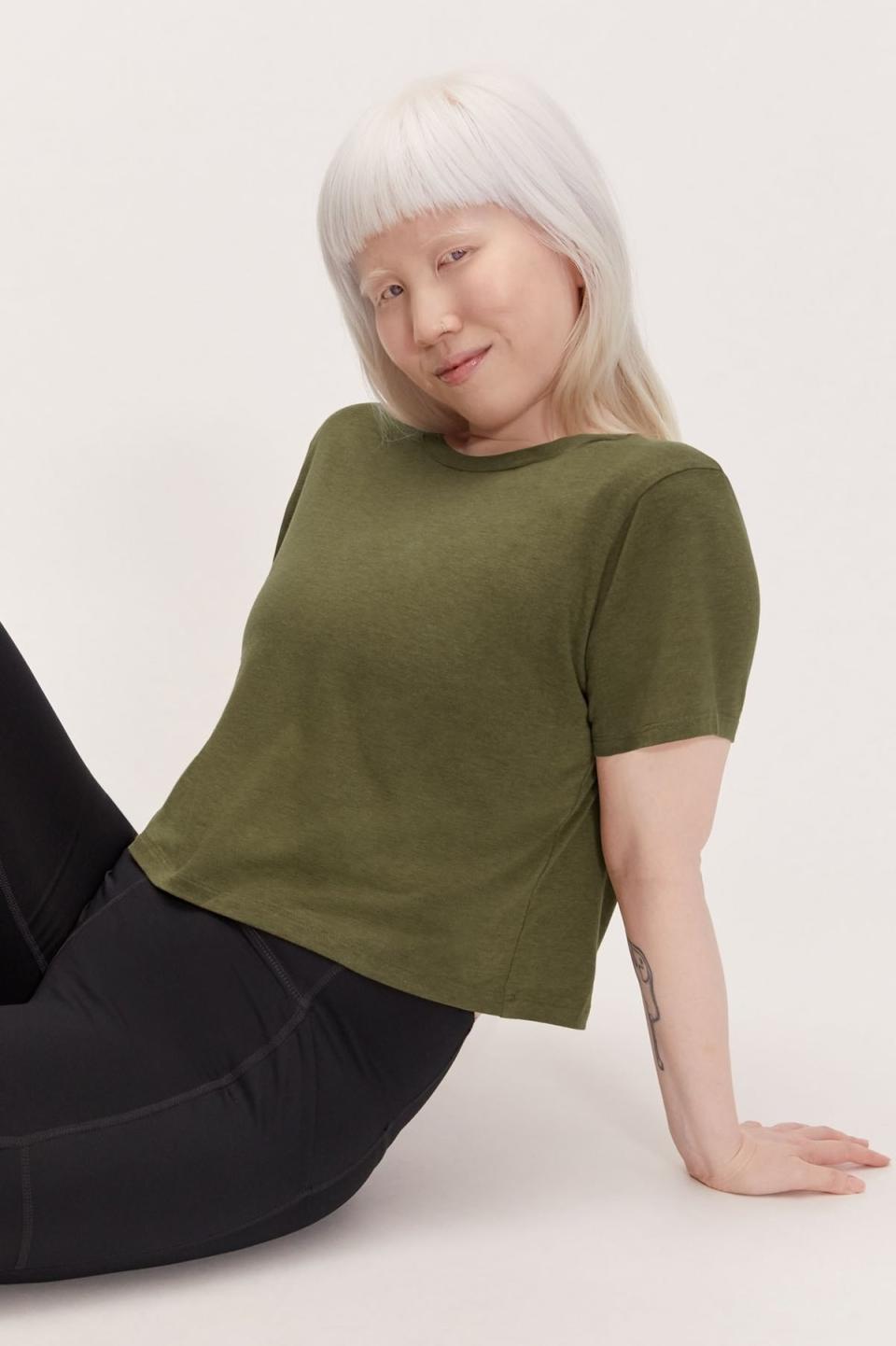 It'll be <i>the</i> top you'll always wear for everything, from barre to kickboxing, because it's comfortable and breathable.<br /><br /><strong>Promising review:</strong> "I love the color, it's a really pretty green to transition through all seasons. The sleeve length is just right and the cropped cut pairs great with high-rise leggings. The fit is slightly smaller than other Girlfriend tees, not tight, but less flowy. Still, a great tee for exercise and casual wearing!" &mdash;<a href="https://go.skimresources.com?id=38395X987171&amp;xs=1&amp;xcust=HPThingsAnyoneWorkOutHomeProbablyNeeds-60a2971ee4b014bd0caf01be&amp;url=https%3A%2F%2Fwww.girlfriend.com%2Fproducts%2Ffern-gia-crop-tee" target="_blank" rel="nofollow noopener noreferrer" data-skimlinks-tracking="5762934" data-vars-affiliate="Rakuten" data-vars-campaign="LoveToWorkoutProductsScarano11320--5762934-" data-vars-href="https://click.linksynergy.com/deeplink?id=yPKHhJU2qBg&amp;mid=43051&amp;murl=https%3A%2F%2Fwww.girlfriend.com%2Fproducts%2Ffern-gia-crop-tee&amp;u1=LoveToWorkoutProductsScarano11320--5762934-" data-vars-keywords="fast fashion" data-vars-link-id="0" data-vars-price="" data-vars-redirecturl="https://www.girlfriend.com/products/fern-gia-crop-tee" data-ml-dynamic="true" data-ml-dynamic-type="sl" data-orig-url="https://click.linksynergy.com/deeplink?id=yPKHhJU2qBg&amp;mid=43051&amp;murl=https%3A%2F%2Fwww.girlfriend.com%2Fproducts%2Ffern-gia-crop-tee&amp;u1=LoveToWorkoutProductsScarano11320--5762934-" data-ml-id="13">Girlfriend Collective Customer<br /><br /></a><strong><a href="https://go.skimresources.com?id=38395X987171&amp;xs=1&amp;xcust=HPThingsAnyoneWorkOutHomeProbablyNeeds-60a2971ee4b014bd0caf01be&amp;url=https%3A%2F%2Fwww.girlfriend.com%2Fproducts%2Ffern-gia-crop-tee" target="_blank" rel="noopener noreferrer">Get it from Girlfriend Collective for $32 (available in women's sizes XXS-6XL and five colors).</a></strong>