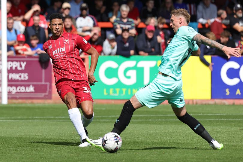 Curtis Davies in action for Cheltenham Town