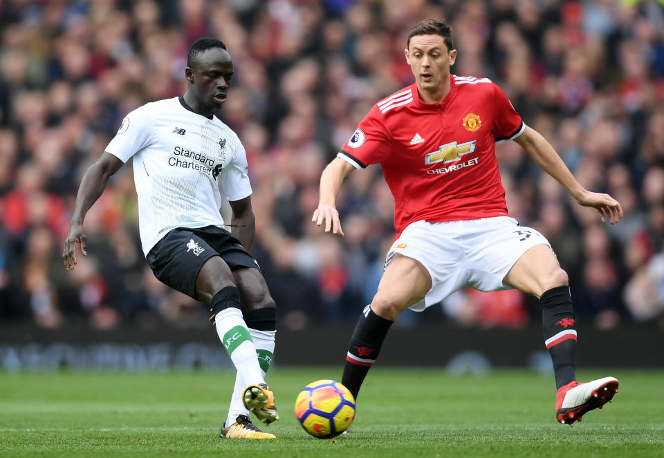 <p>Sadio Mane of Liverpool and Nemanja Matic battle for possession </p>