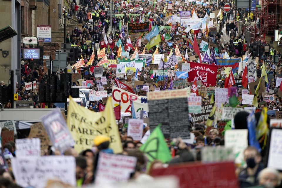 Climate activists march during a demonstration in Glasgow, Scotland, Friday, Nov. 5, 2021, which is the host city of the COP26 U.N. Climate Summit. A protest is taking place as leaders and activists from around the world are gathering in Scotland's biggest city for the U.N. climate summit, to lay out their vision for addressing the common challenge of global warming. (Danny Lawson/PA via AP)