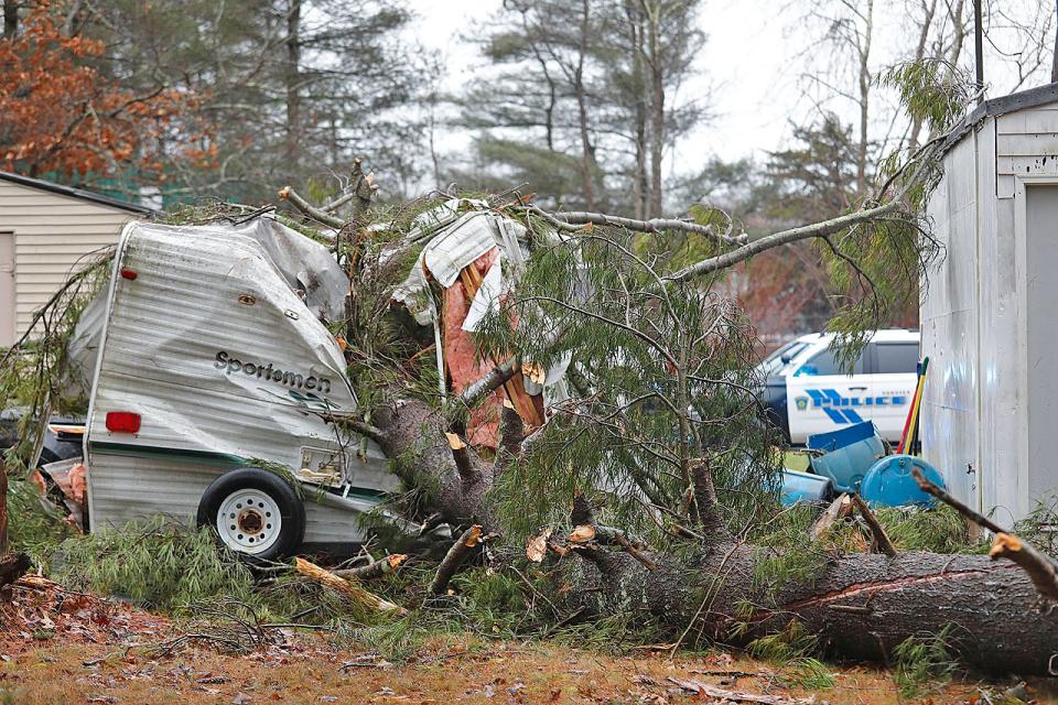 A tree fell on a camper trailer in the Hanover Industrial Park on Monday, Dec. 18, 2023. An 89-year-old Hingham man inside the trailer died.