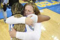 UCLA head coach Cori Close hugs guard Charisma Osborne (20) after a win over Creighton during a second-round college basketball game in the women's NCAA Tournament Monday, March 25, 2024, in Los Angeles. (AP Photo/Marcio Jose Sanchez)
