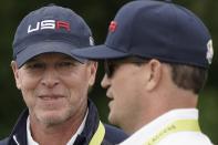 Team USA captain Steve Stricker talks to Zack Johnson at the Whistling Straits Golf Course Monday, Sept. 20, 2021, in Sheboygan, Wis. (AP Photo/Morry Gash)