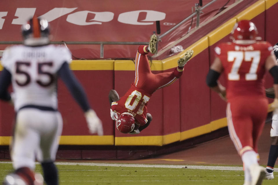 Kansas City Chiefs wide receiver Tyreek Hill (10) does a back flip into the end zone against the Denver Broncos in the second half of an NFL football game in Kansas City, Mo., Sunday, Dec. 6, 2020. The 48-yard scoring play was nullified by an offensive holding penalty. (AP Photo/Charlie Riedel)