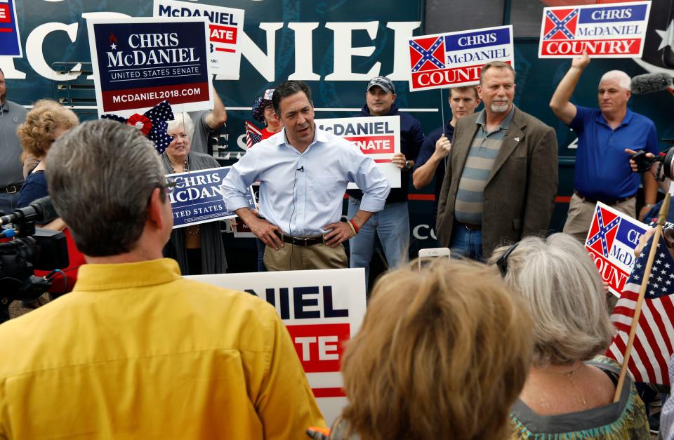 State Sen. Chris McDaniel, R-Ellisville, center, addresses the crowd at a shopping center in Flowood on Monday, Nov. 5, 2018. McDaniel hopes to unseat appointed U.S. Sen. Cindy Hyde-Smith, R-Miss., and serve the last two years of the six-year term vacated when Republican Thad Cochran retired for health reasons.