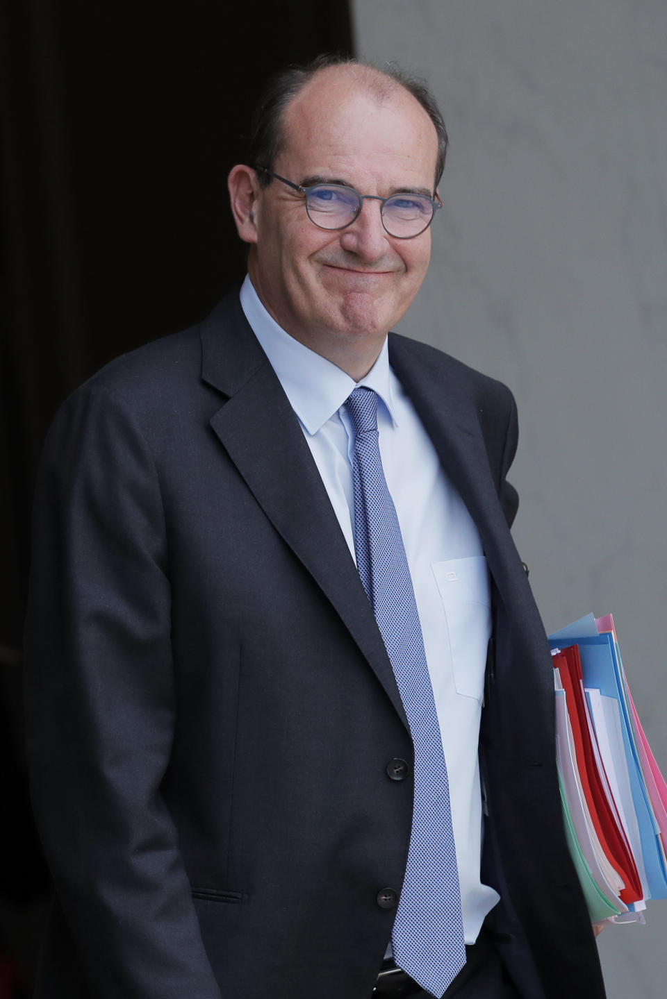 France's Prime Minister Jean Castex leaves after the weekly cabinet meeting at the Elysee Palace in Paris, Wednesday, July 15, 2020. (AP Photo/Christophe Ena)