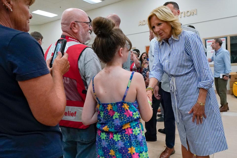 First lady Jill Biden talks with a girl who was impacted by Hurricane Idalia during a visit to Suwannee Pineview Elementary School, Saturday, Sept. 2, 2023, in Live Oak, Fla.