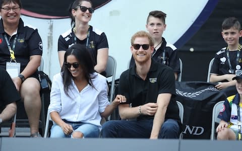 Prince Harry and Meghan Markle at the wheelchair tennis - Credit: Stephen Lock/ i-Images