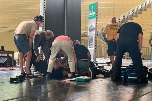 PHOTO: Author Salman Rushdie is tended to after he was attacked during a lecture, Aug. 12, 2022, at the Chautauqua Institution in Chautauqua, N.Y. (Joshua Goodman/AP)