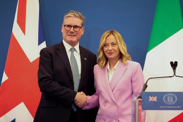 Sir Keir Starmer shaking hands with Giorgia Meloni