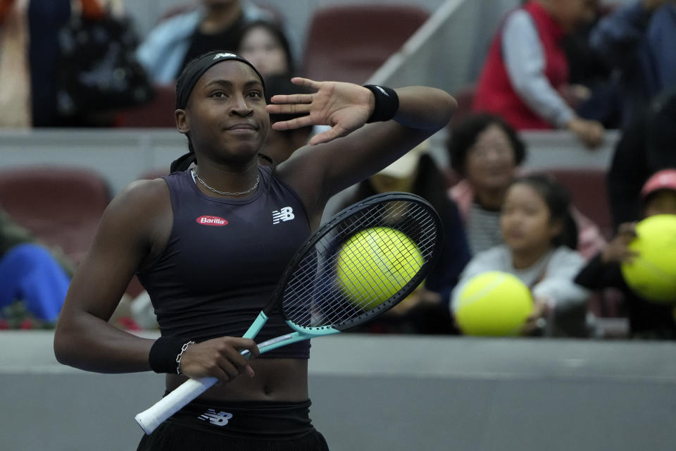 Coco Gauff of the United States celebrates after defeating Maria Sakkari of Greece in the women's singles quarterfinal match of the China Open tennis tournament at the Diamond Court in Beijing, Friday, Oct. 6, 2023. (AP Photo/Andy Wong)