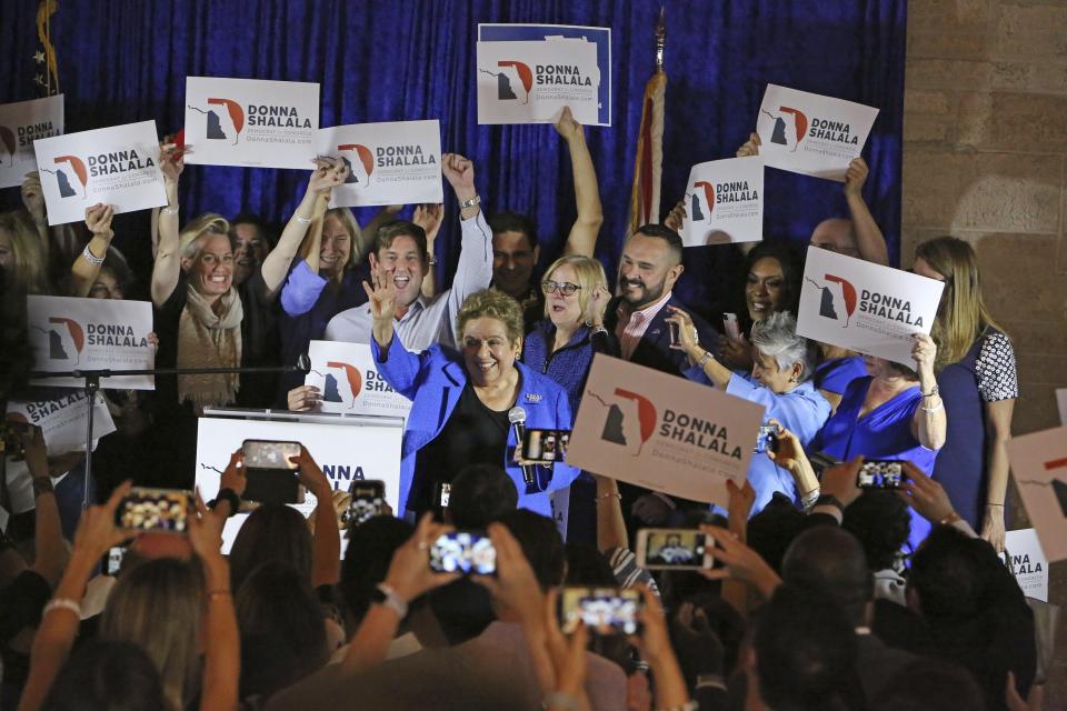 District 27 Democratic candidate Donna Shalala, center, celebrates her victory over Republican television journalist Maria Elvira Salazar at the Coral Gables Woman's Club, Tuesday, Nov., 6, 2018, in Coral Gables, Fla. (Emily Michot/Miami Herald via AP)