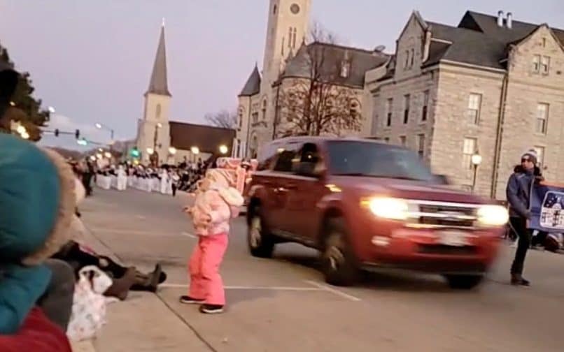 The red SUV was driven into parade in Waukesha at high speed - JESUS OCHOA/REUTERS