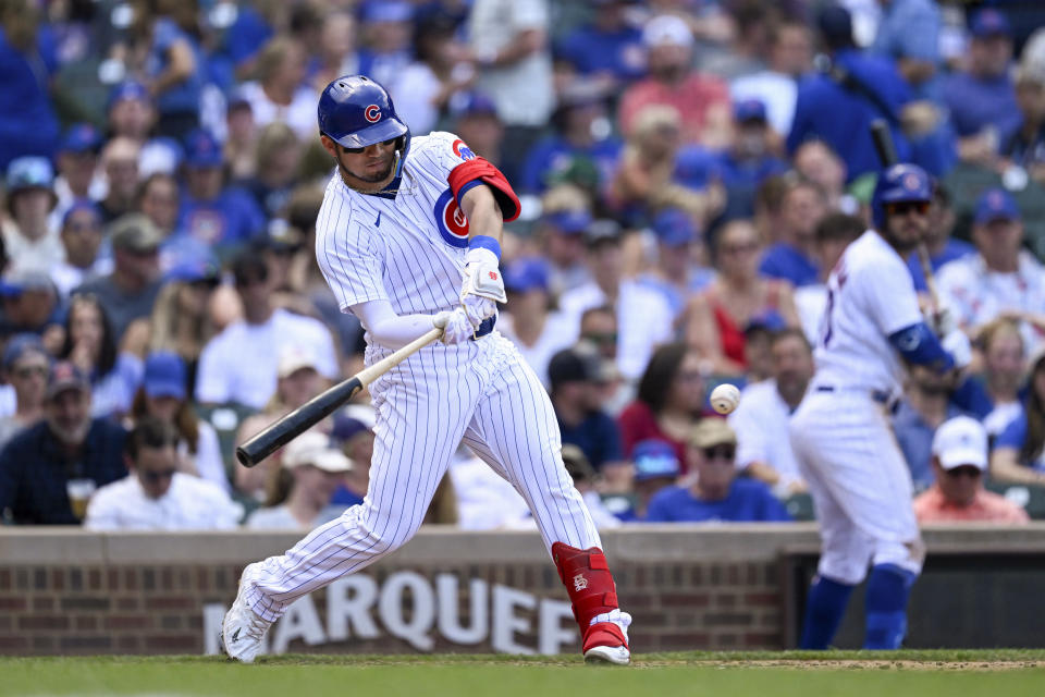 Chicago Cubs' Seiya Suzuki hits a single during the fourth inning of a baseball game against the Tampa Bay Rays on Wednesday, May 31, 2023, in Chicago. (AP Photo/Quinn Harris)