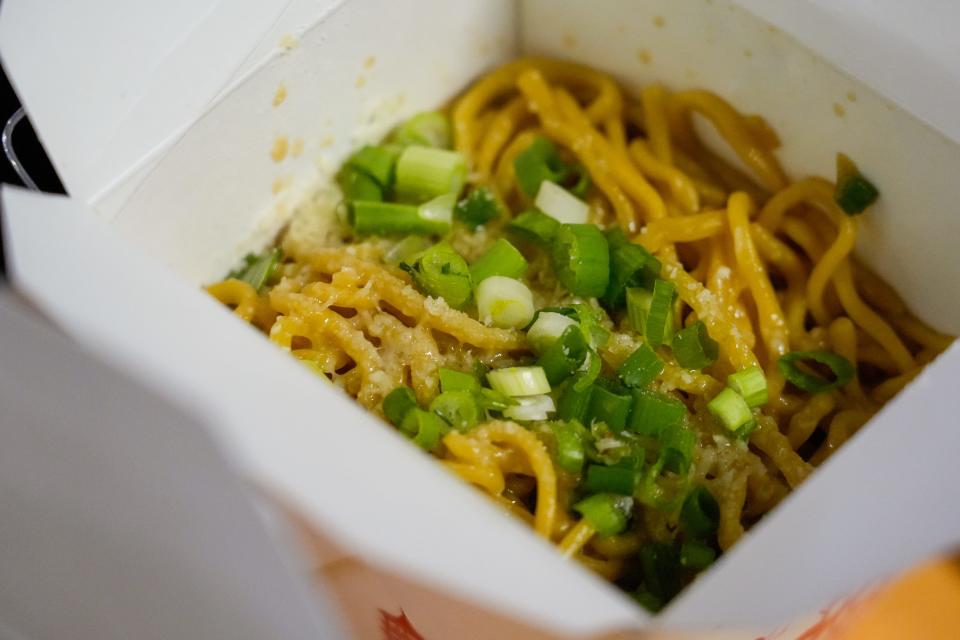 An order of Garlic Noodles from Nice Nice Noodles at The Gatherall food hall in Norwood, Ohio, on Monday, Feb. 12, 2024.