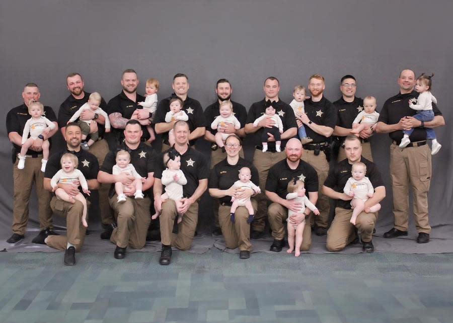 The Boone County Sheriff’s Office shared an image of their deputies with their young children, calling it the “BCSO Baby Boom.” (Boone County Sheriff’s Office)