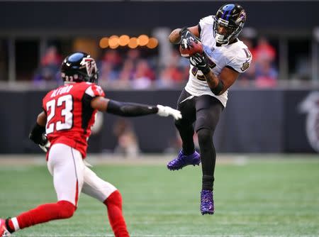 FILE PHOTO - Dec 2, 2018; Atlanta, GA, USA; Baltimore Ravens wide receiver Michael Crabtree (15) makes a catch in front of Atlanta Falcons cornerback Robert Alford (23) during the second half at Mercedes-Benz Stadium. Mandatory Credit: Dale Zanine-USA TODAY Sports