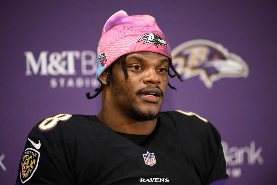 FILE - Baltimore Ravens quarterback Lamar Jackson speaks to the media at a press conference after an NFL football game against the Cincinnati Bengals, Oct. 9, 2022, in Baltimore. The Baltimore Ravens announced Tuesday, March 7, 2023, that they were designating Jackson as their franchise player, preventing him from becoming an unrestricted free agent this month after the expiration of his rookie contract. (AP Photo/Nick Wass, File)