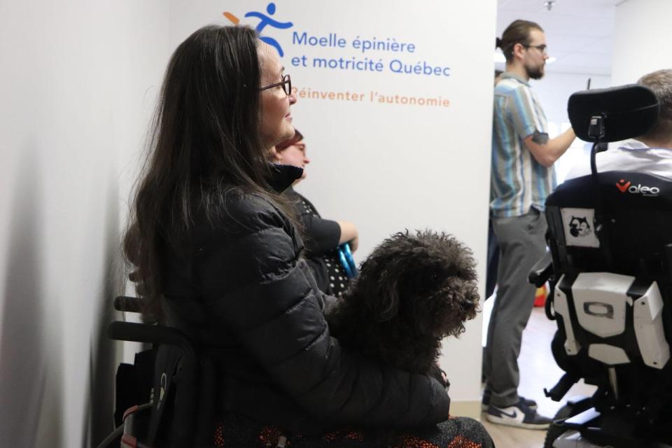Lise Vachon attended the event held by the community organization in Quebec City alongside her dog, Priram. 