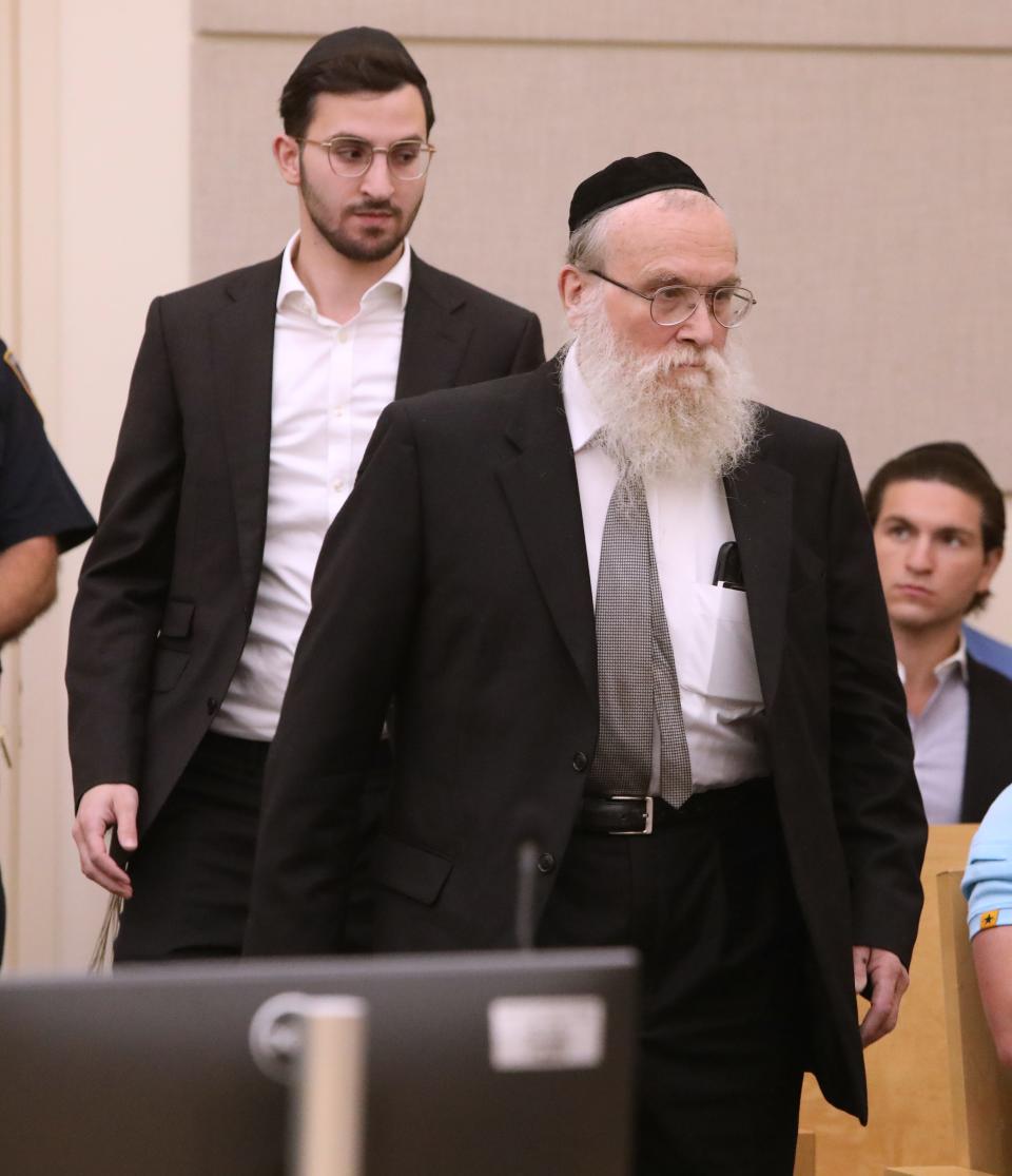 Rabbis Nathaniel Sommer and son Aaron appear in Rockland County Court to accept a plea bargain in their manslaughter case June 20, 2023. They were charged in the death of Spring Valley firefighter Jared Lloyd and facility resident Oliver Hueston, who were killed in a fire at the Evergreen Court nursing home.