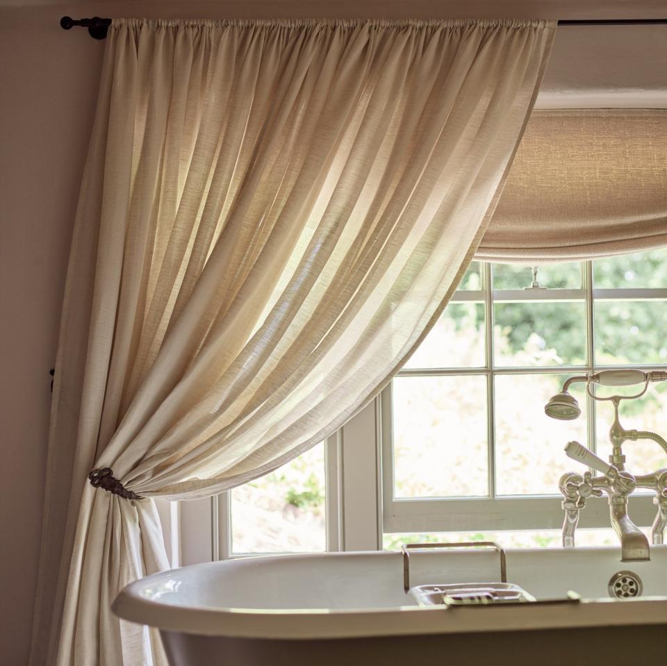 Tori Murphy rod pocket curtain in Sheer Natural from £430, Cove relaxed Roman blind from £195, torimurphy.com