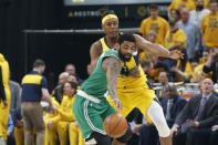 Apr 19, 2019; Indianapolis, IN, USA; Boston Celtics guard Kyrie Irving (11) dribbles the ball againts Indiana Pacers center Myles Turner (33) during the first quarter in game three of the first round of the 2019 NBA Playoffs at Bankers Life Fieldhouse. Mandatory Credit: Brian Spurlock-USA TODAY Sports