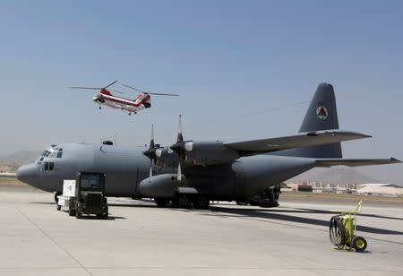 An Afghan Air Force C-130 military transport plane is parked before a flight in Kabul, Afghanistan July 9, 2017. REUTERS/Omar Sobhani