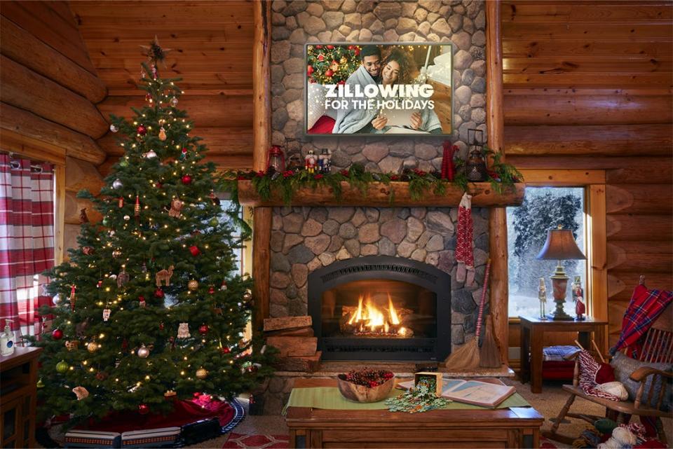 Photo of the water rock fireplace inside Santa's home next to a Christmas tree