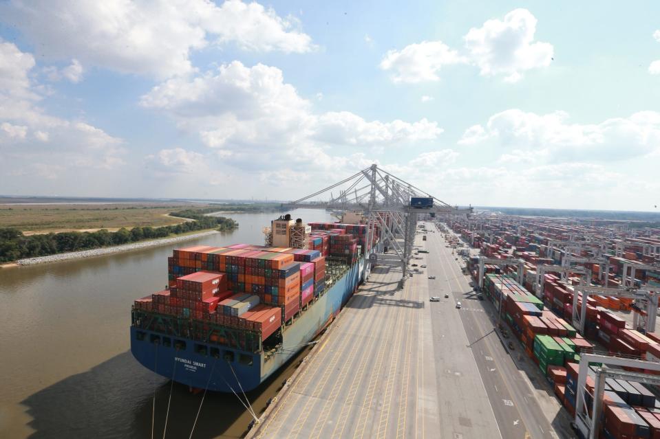 Containers are being loaded and unloaded from the Hyundai Smart on Friday October 15, 2021 at the Georgia Ports Authority.