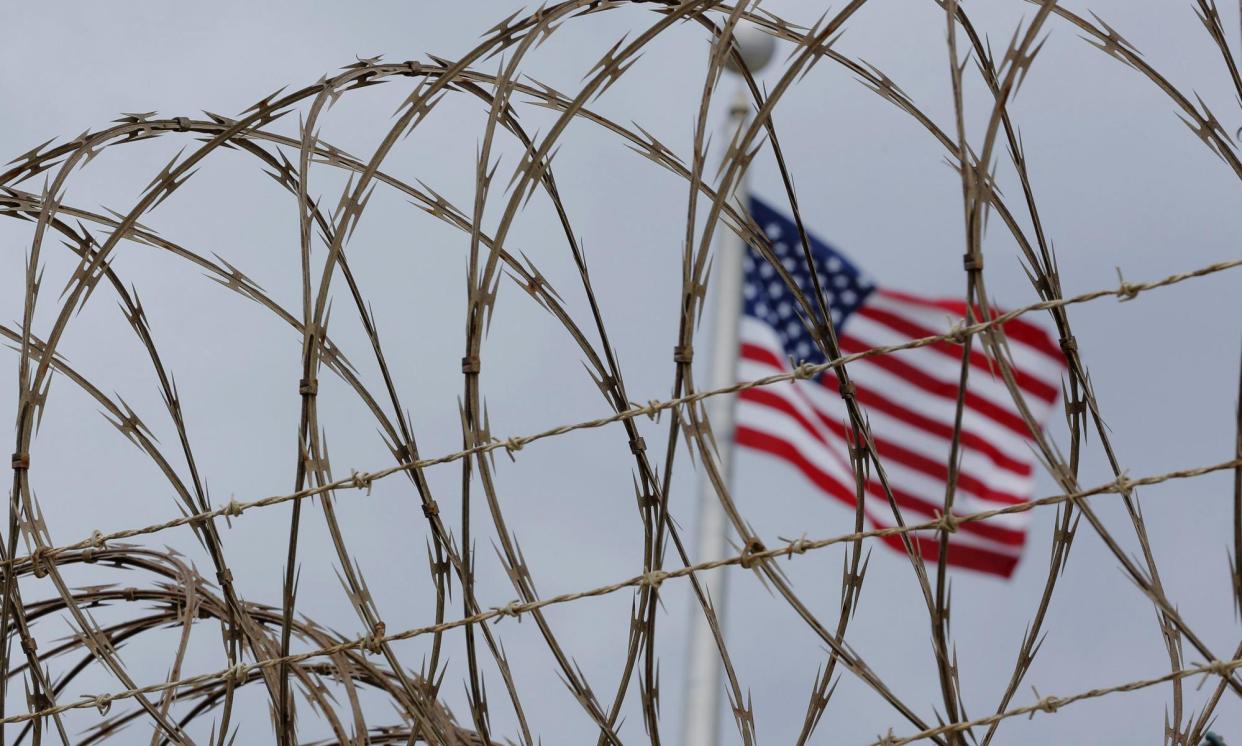 <span>The United States flag flies inside the Guantánamo Bay detention facility at the US naval base in Guantánamo Bay, Cuba.</span><span>Photograph: Lucas Jackson/Reuters</span>