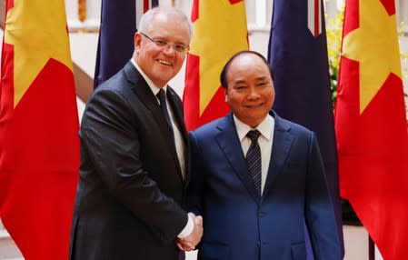 Australian Prime Minister Scott Morrison poses for a photo with his Vietnamese counterpart Nguyen Xuan Phuc in Hanoi