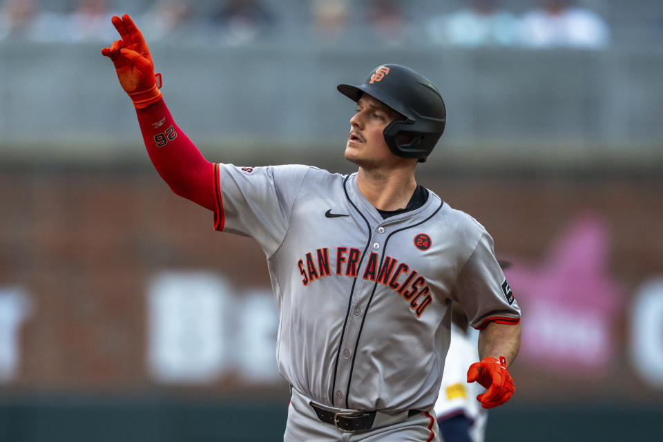 San Francisco Giants Matt Chapman rounds second base after hitting a home run to center field during the fourth inning of a baseball game against the Atlanta Braves, Thursday, July 4, 2024, in Atlanta. (AP Photo/Jason Allen)