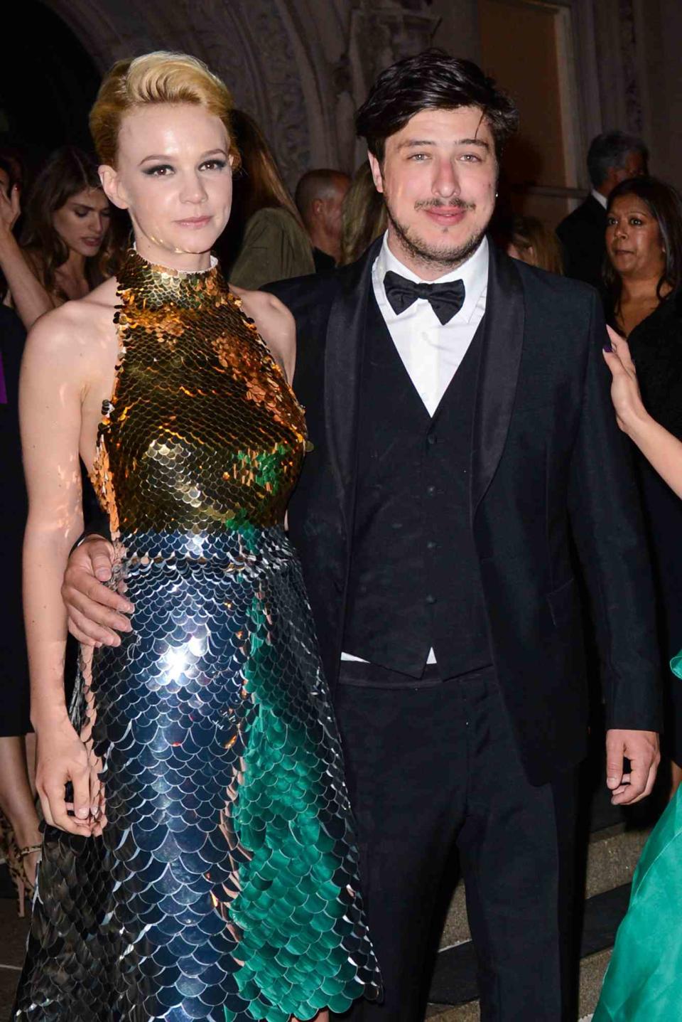 Carey Mulligan (L) and singer Marcus Mumford leave an after party at the Ukrainian Institute of America on May 7, 2012 in New York City