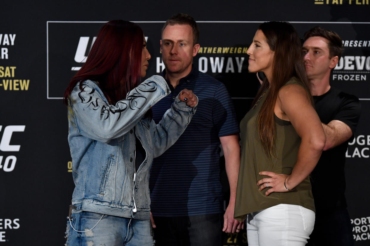 EDMONTON, AB - JULY 25:  (L-R) Opponents Cris Cyborg of Brazil and Felicia Spencer of Canada face off for media during the UFC 240 Ultimate Media Day at Delta Hotels by Marriott Edmonton South Conference Centre on July 25, 2019 in Edmonton, Alberta, Canada. (Photo by Jeff Bottari/Zuffa LLC/Zuffa LLC via Getty Images)