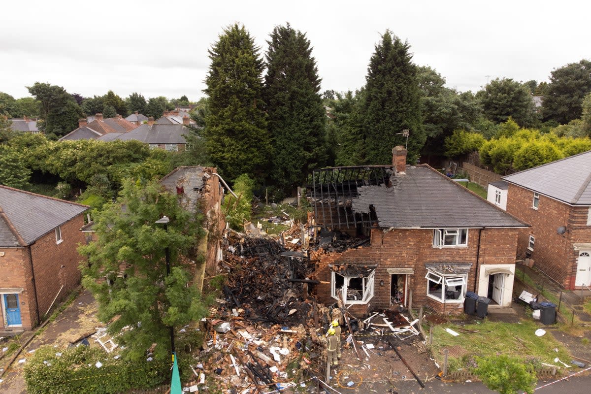 A woman has been found dead after a house collapsed following a gas explosion which saw heroic neighbours pull one casualty to safety (Joe Giddens/PA) (PA Wire)