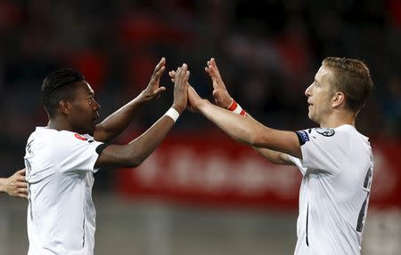 Austria's David Alaba celebrates with teammate Marc Janko (R) after scoring the third goal against Liechtenstein during their Euro 2016 qualifying soccer match in Vaduz March 27, 2015. REUTERS/Dominic Ebenbichler